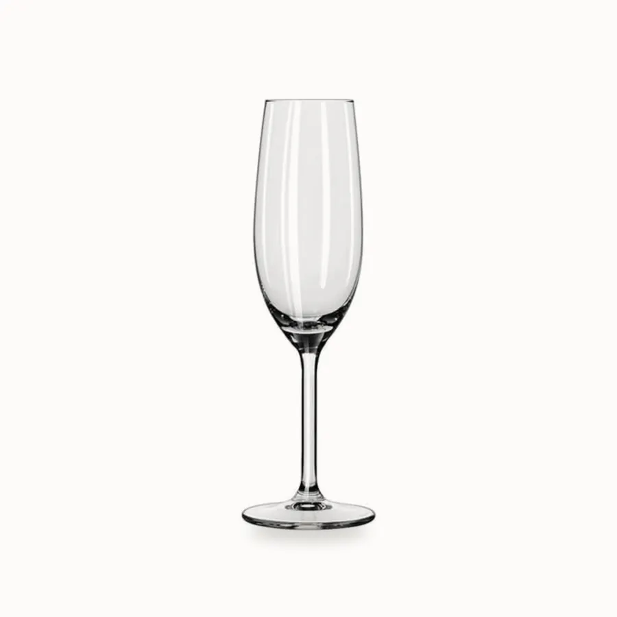 Høyt og smalt champagneglass på stett