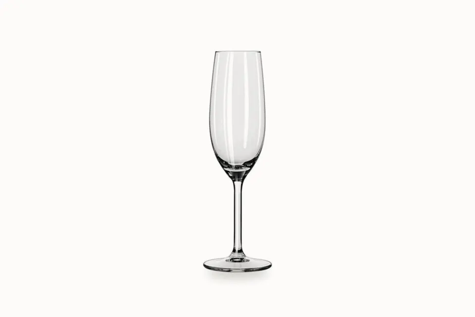 Høyt og smalt champagneglass på stett