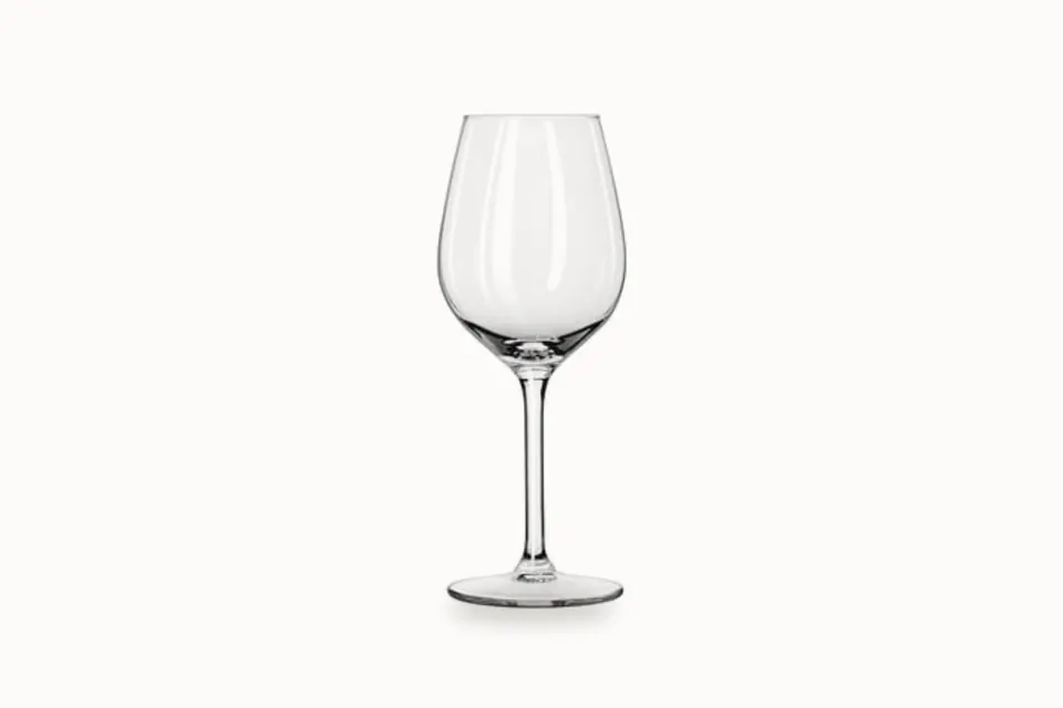 Hvitvinsglass på stett i klart glass